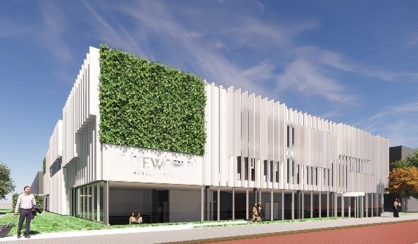 Nieuw hotelgebouw met groene gevel in Hoofddorp
